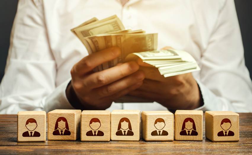 Block people with man holding money - Unpaid Wages